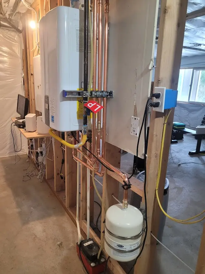 Licensed plumber repairing a kitchen sink in Marlboro Meadows